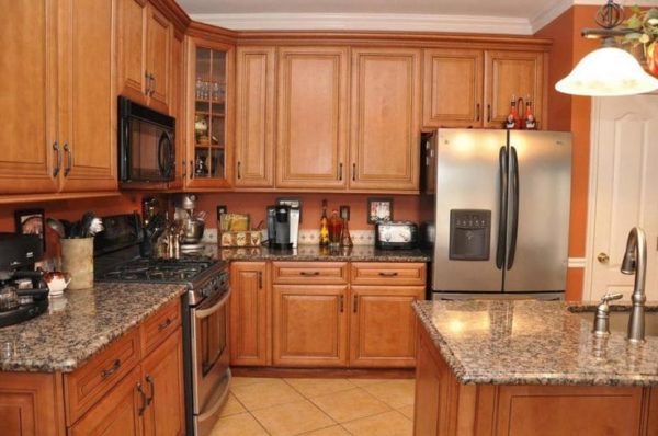 Kitchen Wall Colors With Dark Oak Cabinets Using Golden Yellow